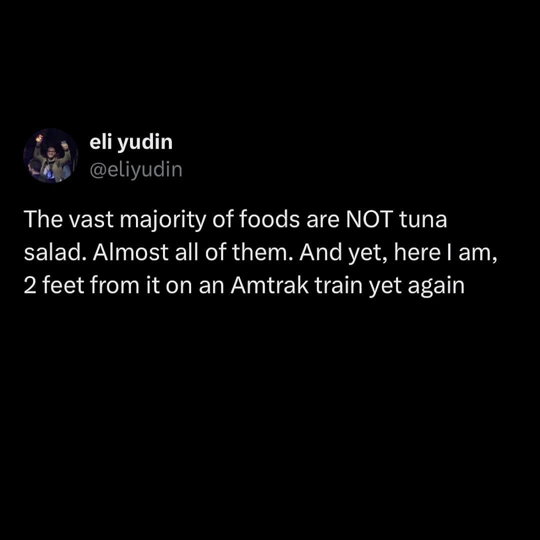 A hilarious tweet complaining about the statistical improbability of always sitting near someone eating tuna salad on a train.