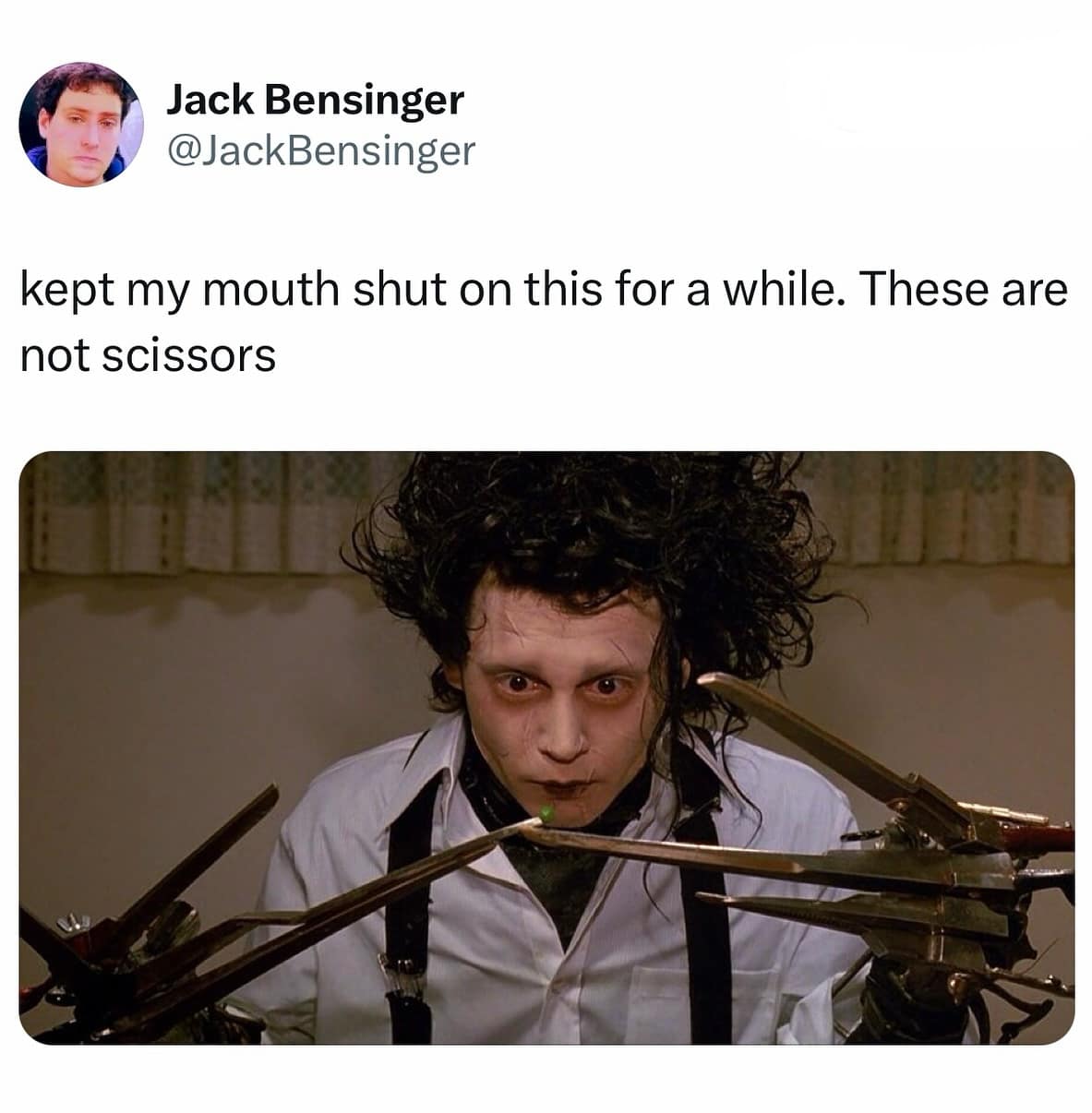A funny tweet of Edward Scissorhands with a caption pointing out his hands are not scissors.