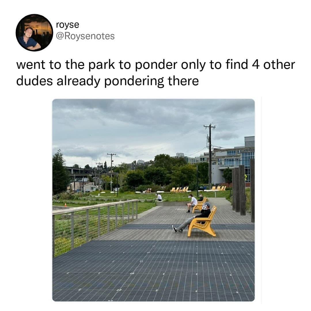 A picture of a park where several men are sitting alone, pondering, with a funny caption. Description: This tweet captures a surprisingly common and humorous moment of shared solitude. It's one of those simple but funny memes that finds the comedy in everyday observations about how people use public spaces.