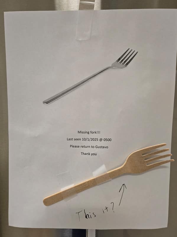 A funny response to a "Missing fork" sign where someone has offered a cheap wooden fork as a replacement.