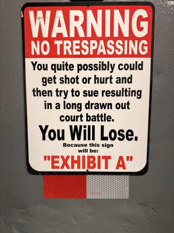 A "No Trespassing" sign that warns trespassers they will lose in court and the sign will be "Exhibit A."