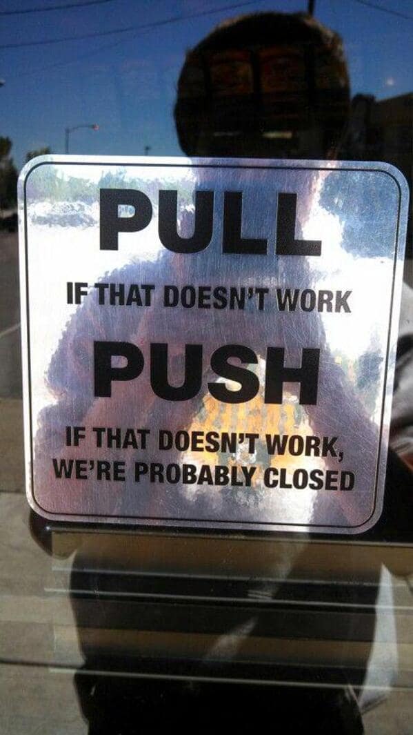 A helpful door sign that says to pull, then push, and if that fails, they're probably closed.