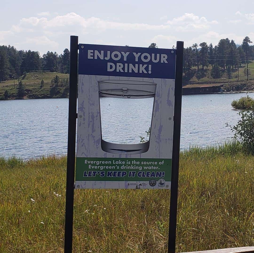 Funny sign near a lake that accidentally encourages people to drink the lake water