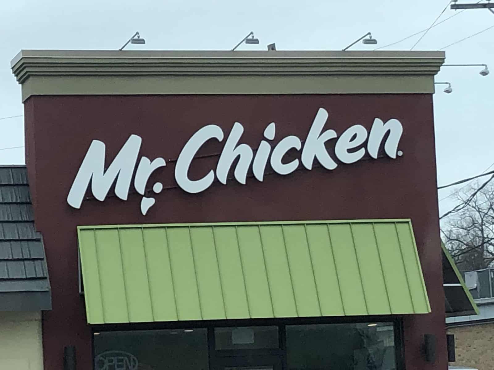 Funny sign for a fast-food restaurant with the simple and direct name "Mr. Chicken".