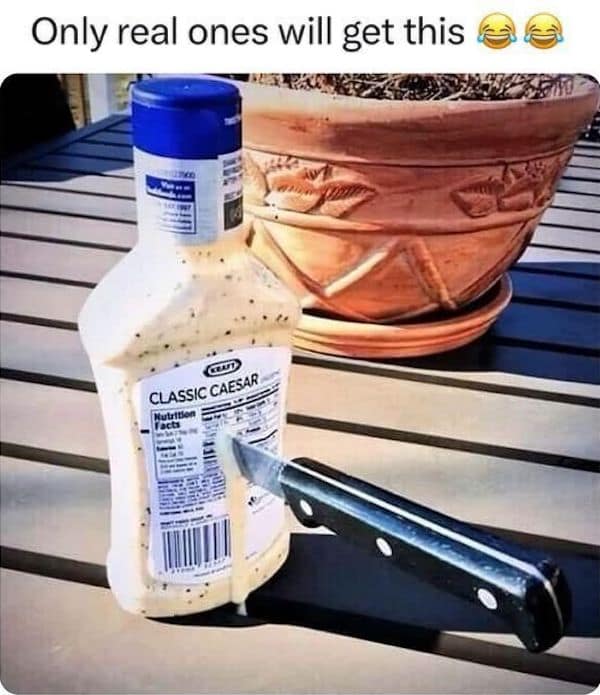 A clever history-based grumpy meme showing a knife in a bottle of Caesar dressing.