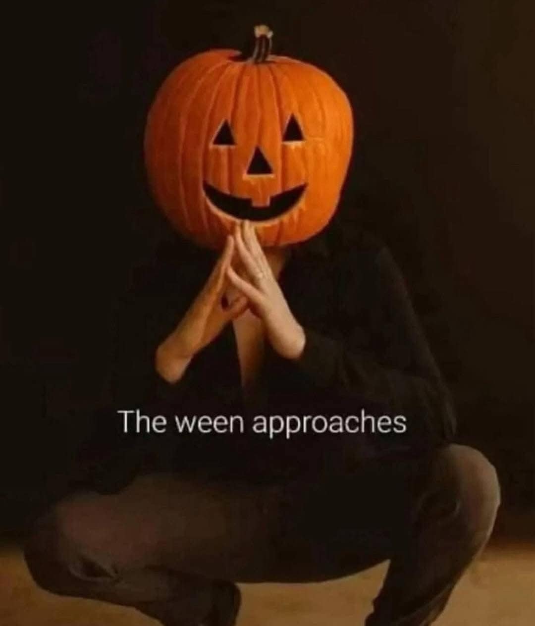 A funny meme showing a person with a jack-o'-lantern on their head with the caption, "The ween approaches."
