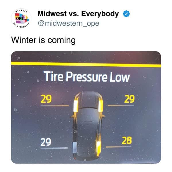Relatable Midwest meme showing a car's tire pressure warning screen as the first sign of approaching winter.