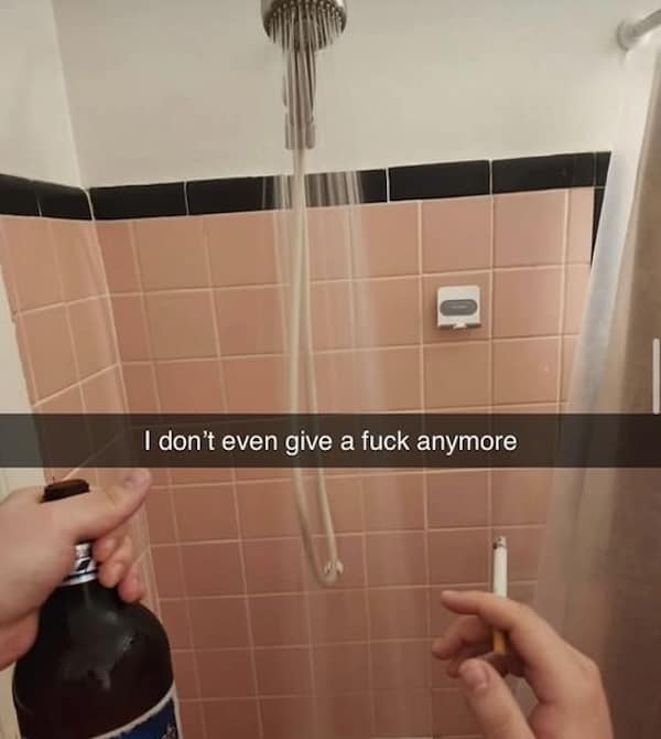 A funny and chaotic meme of a person sitting in a running shower while drinking a beer and smoking a cigarette.