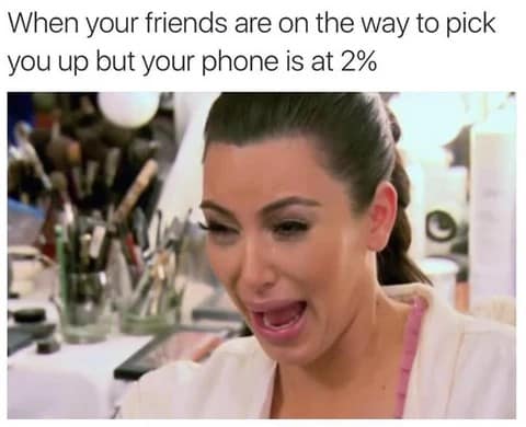 A funny meme using the Kim Kardashian crying face to represent the panic of having a low phone battery.