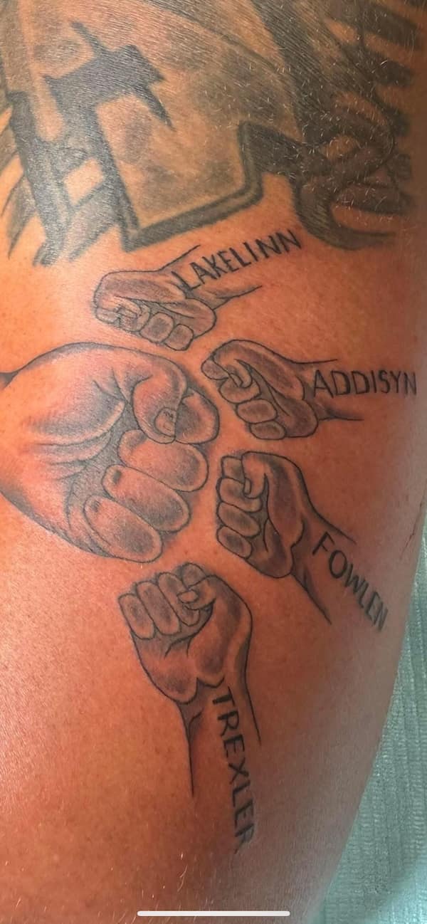 An unfortunate name tattoo showing a family of fist bumps with the unique names Lakelinn, Addisyn, Fowlen, and Trexler