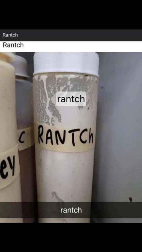 A classic meme of a "cursed" food label in a restaurant, misspelled as "rantch."