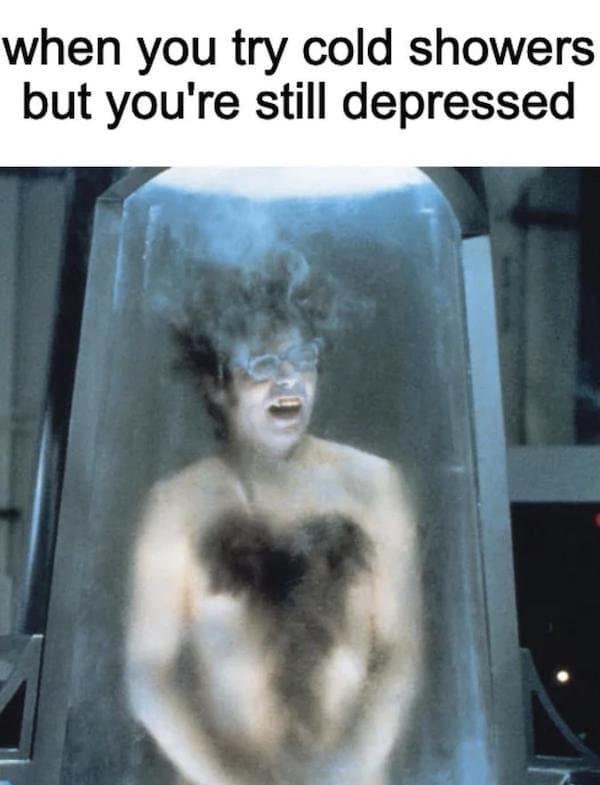 A classic meme of Austin Powers frozen, joking "when you try cold showers but you're still depressed."
