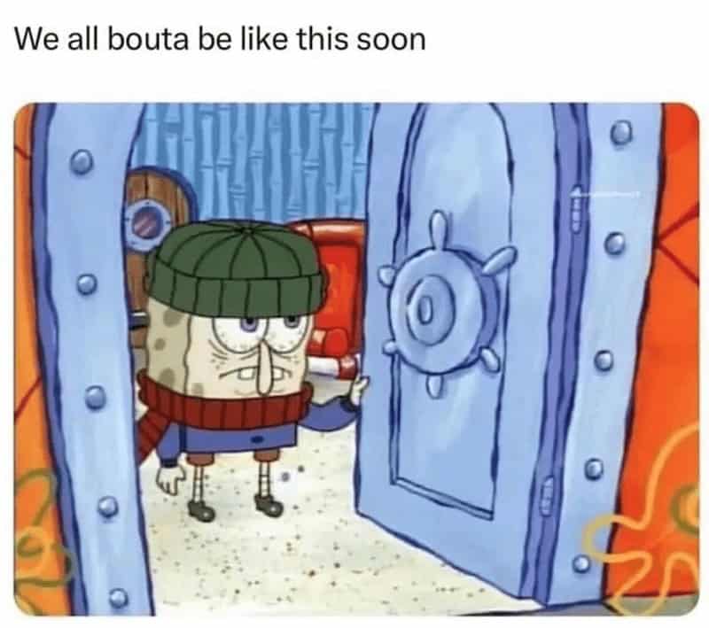 SpongeBob SquarePants bundled in a hat and scarf, looking grumpy by the Krusty Krab door.