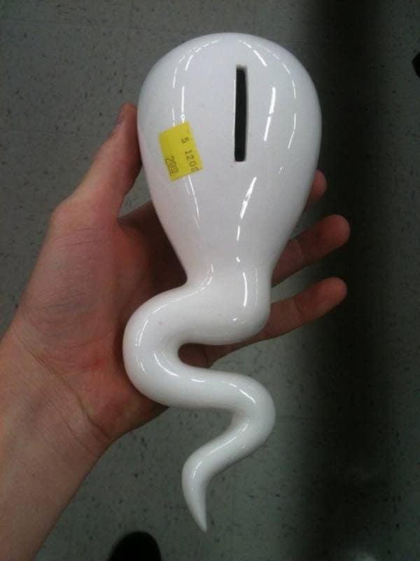 Hilarious white ceramic coin bank shaped exactly like a swimming sperm cell.