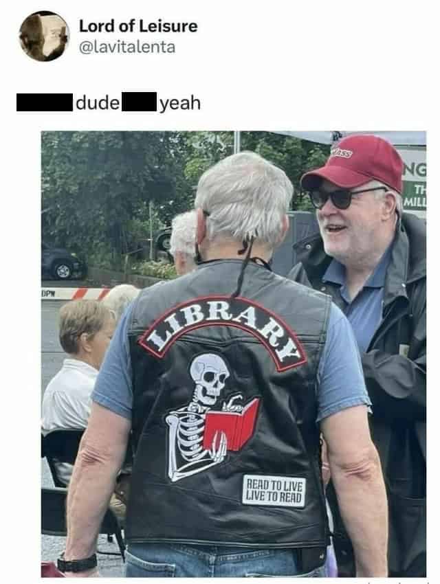 A funny dad meme of an old man wearing a "LIBRARY" biker vest with a skeleton reading a book