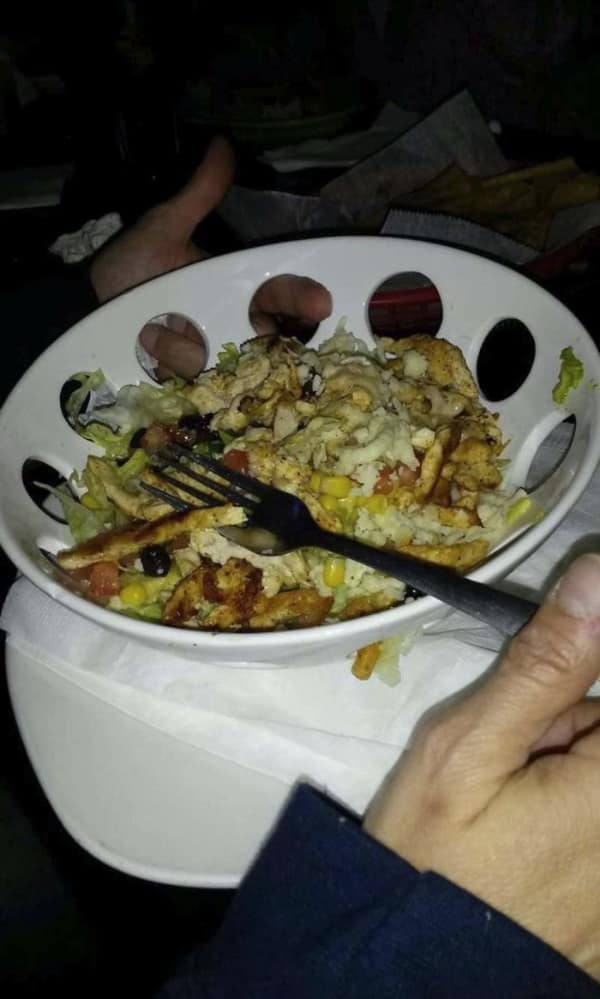 A practical design fail showing a salad bowl with giant holes in the sides.