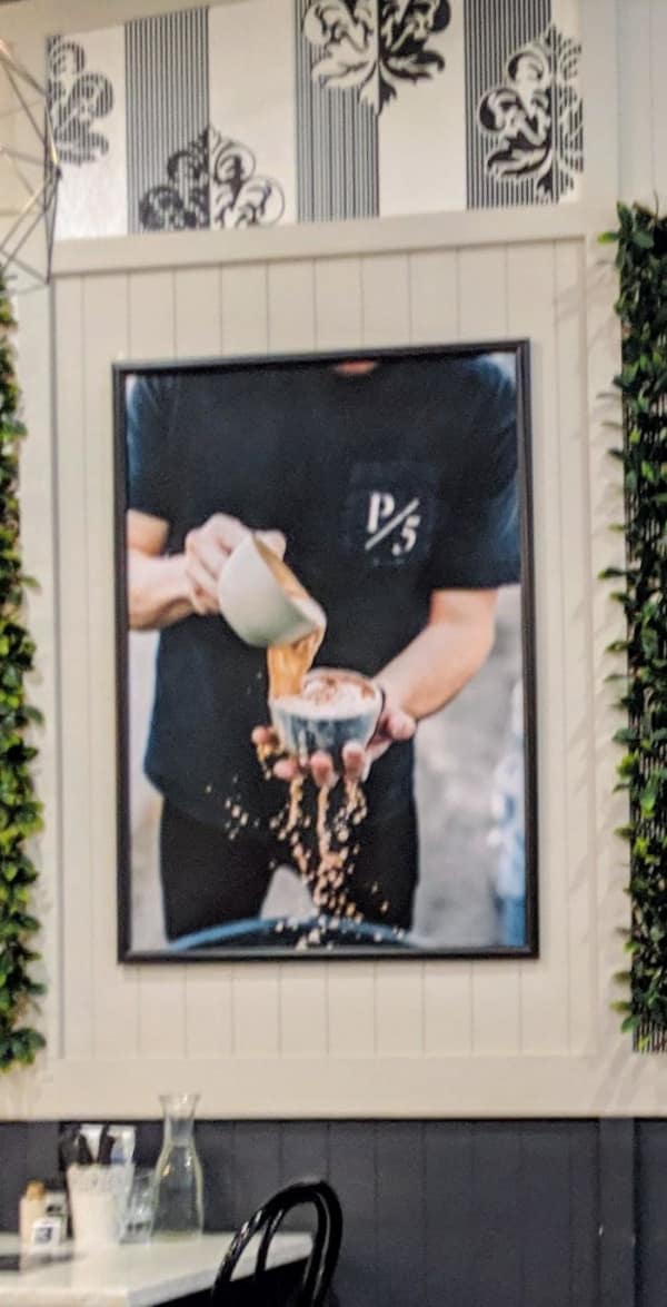 A stock photo design fail showing coffee pouring as solid chunks.