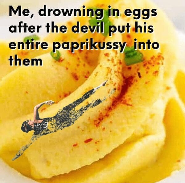 Meme showing a person diving into a giant deviled egg with paprika seasoning.