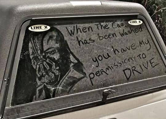 Bane from The Dark Knight Rises drawn in dust with a quote about permission to drive.