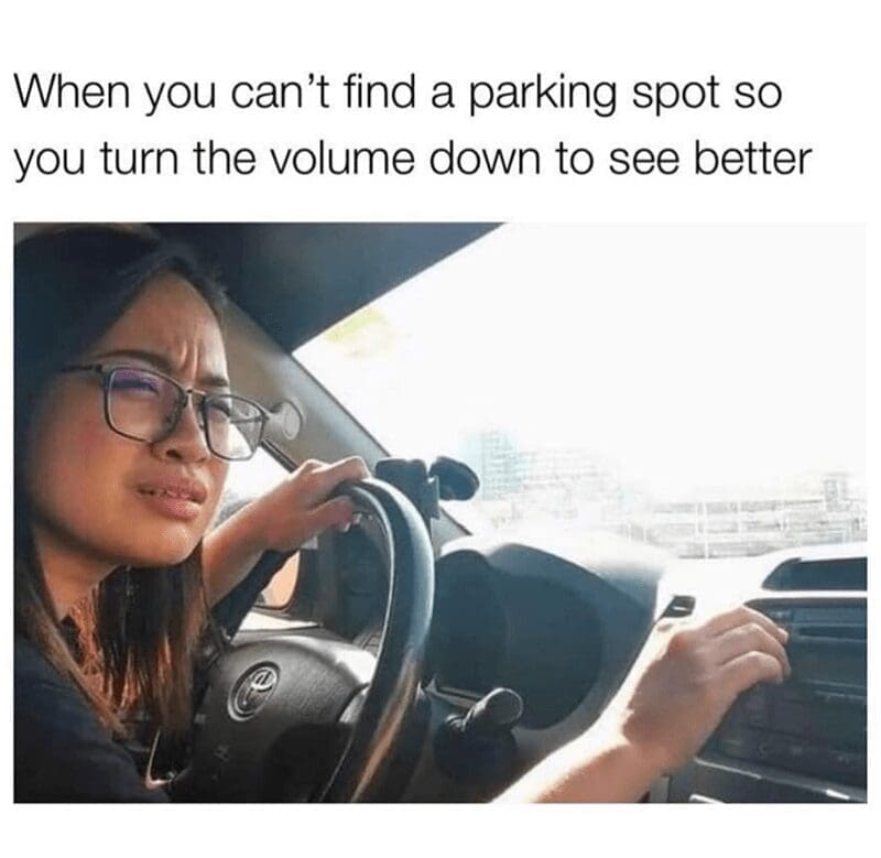 Woman squinting and turning down car radio volume to park better meme.