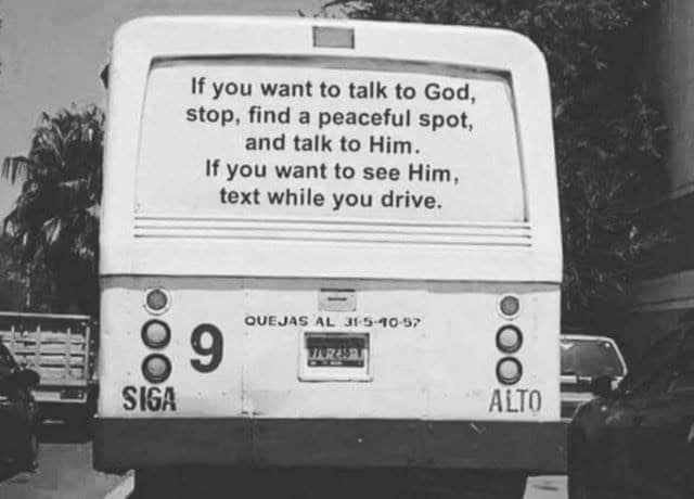 A dark humor dumb life hack on the back of a bus, "If you want to see God, text while you drive."