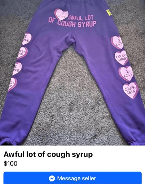 A weird Facebook Marketplace fail of purple sweatpants that say "I Love Awful Lot of Cough Syrup."