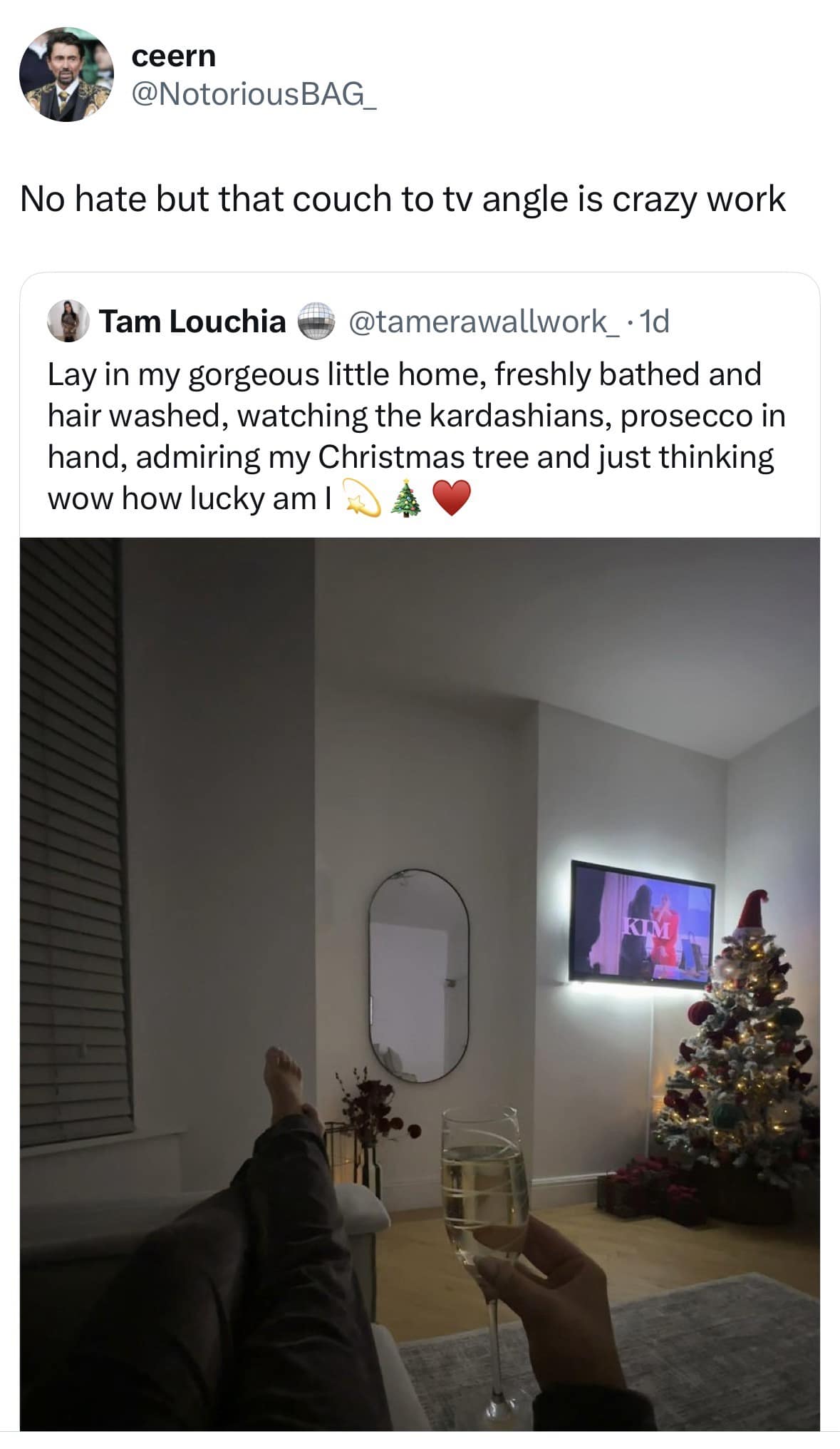 Photo of a TV mounted at a painful 90-degree angle showing Kim Kardashian in a hilarious meme.