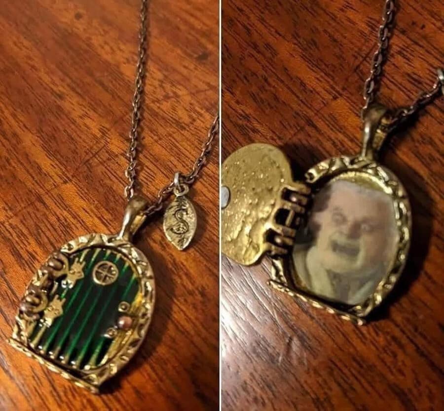 A hilarious meme of a beautiful Lord of the Rings locket that opens to reveal the "screaming Bilbo" face.
