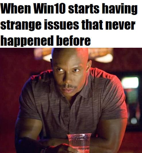 A funny meme with a suspicious character, joking about Windows 10 having "strange issues" right before a new release