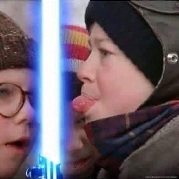 A Christmas Story parody showing a kid licking a lightsaber blade