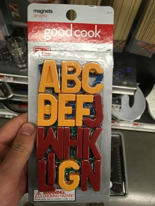 A package of alphabet magnets that are in a completely random, jumbled, and non-alphabetical order.