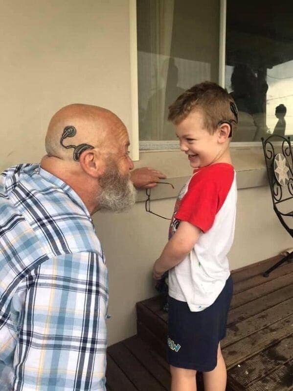 A wholesome grandfather who got a cochlear implant tattoo to match his hearing-impaired grandson.