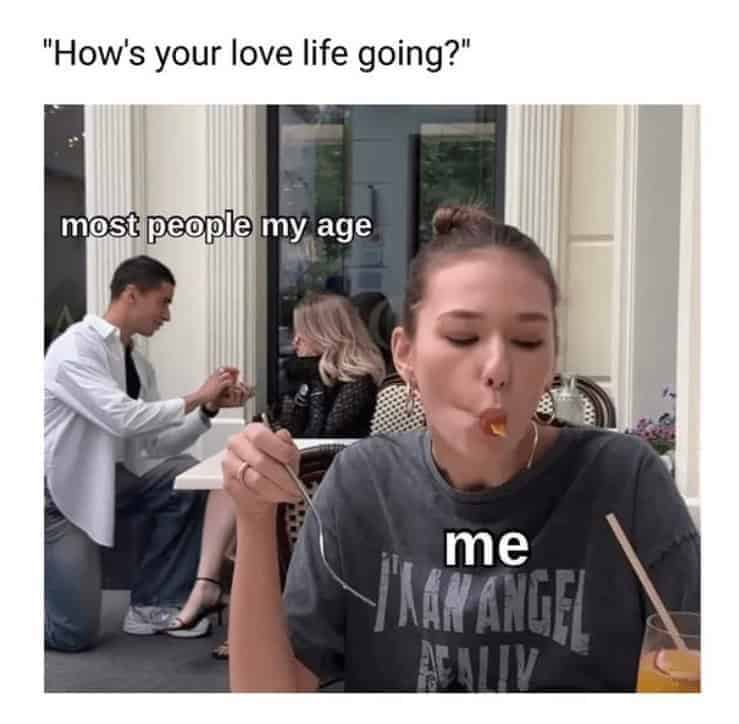 Funny self-deprecating meme comparing a proposal to a woman eating alone when asked "how's your love life?"