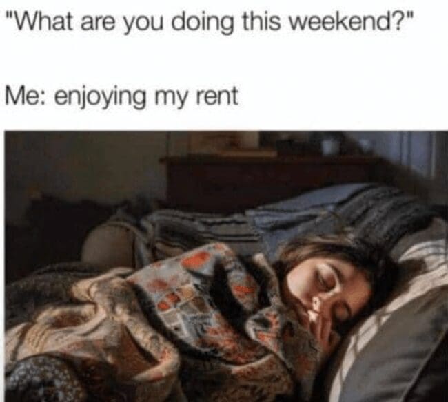 Person sleeping comfortably in a dark room in a Sunday meme about enjoying rent.