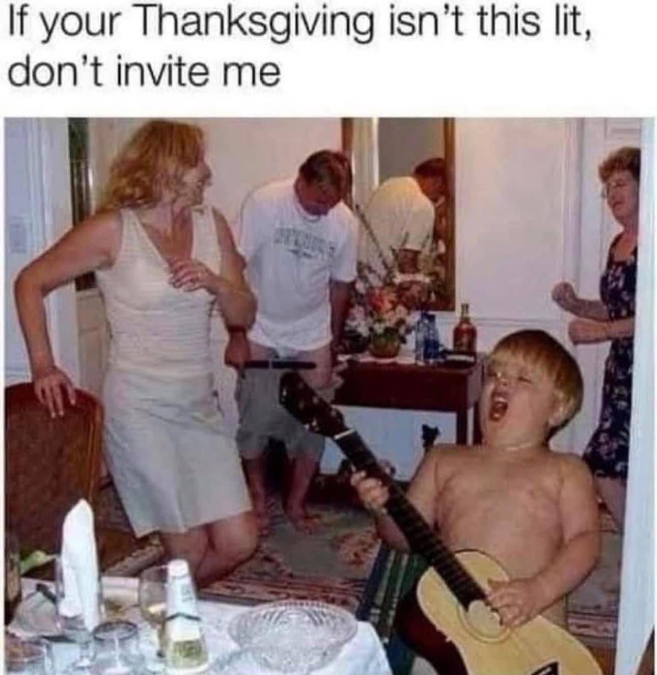 Thanksgiving meme 2025 of a child playing guitar during a chaotic dinner