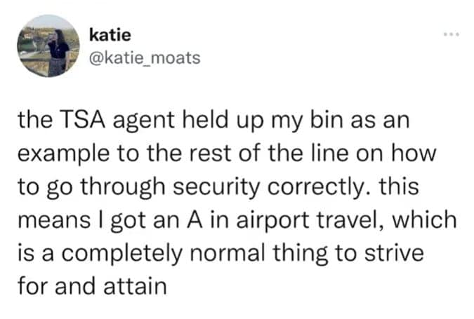 Tweet celebrating getting an A plus in airport travel for perfect security bin organization.
