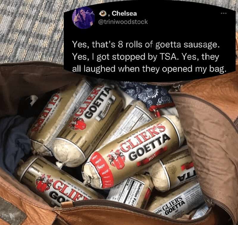 Carry-on bag filled completely with eight rolls of Glier's Goetta sausage meat.