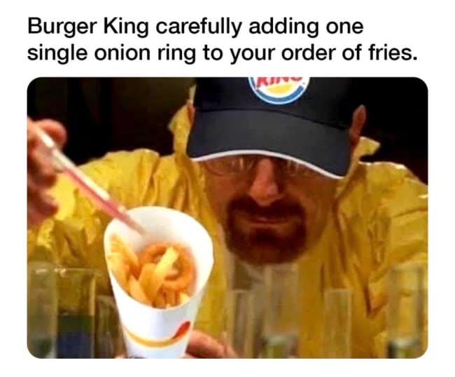Funny Walter White meme photoshopped with a Burger King hat carefully adding one onion ring to fries.