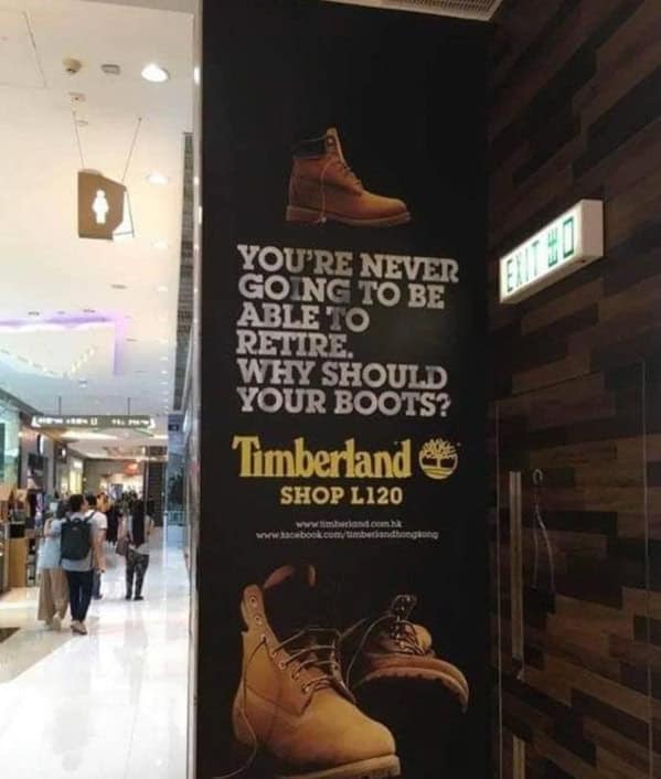 A bleakly funny Timberland ad that reads, "You're never going to be able to retire. Why should your boots?"
