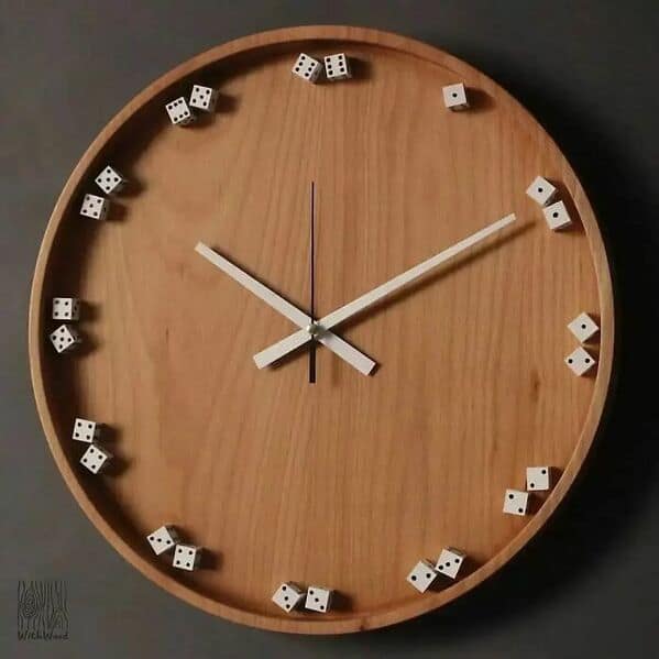 An amazing woodworking wall clock using dice instead of numbers.