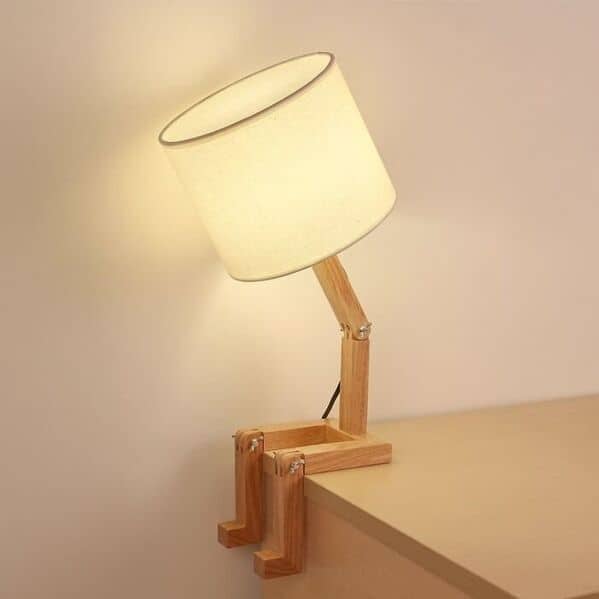 An amazing woodworking lamp designed to look like a sitting person with jointed legs