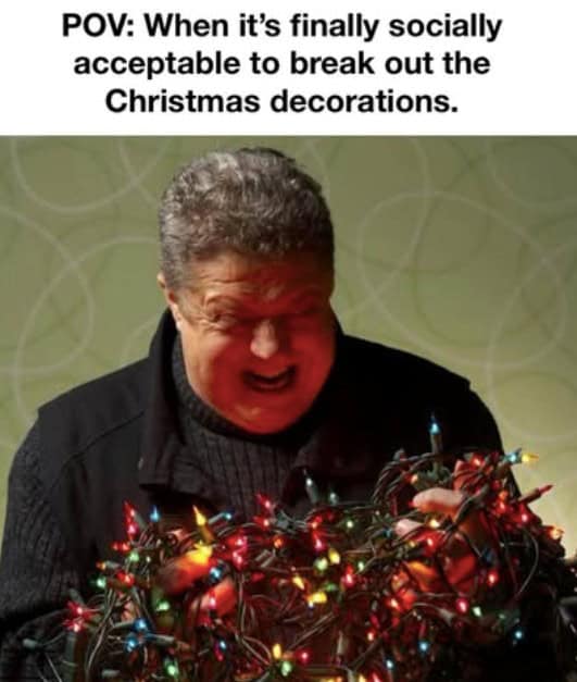 This christmas meme shows John Goodman covered in tangled lights screaming