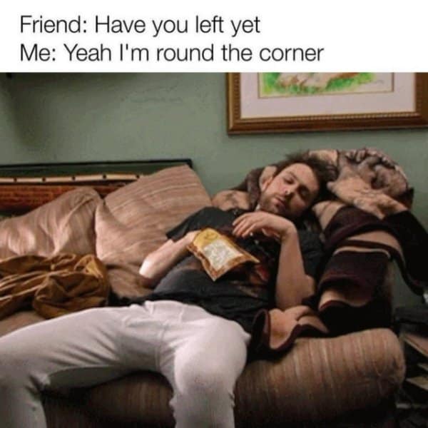 A classic meme of a man sleeping on a couch while texting that he is "round the corner".