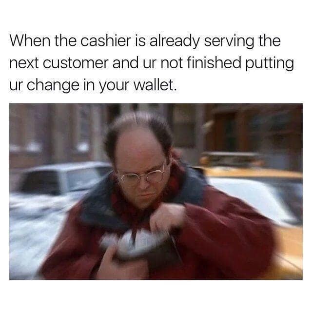 A classic meme of George Costanza struggling with a wallet while a cashier serves the next person.