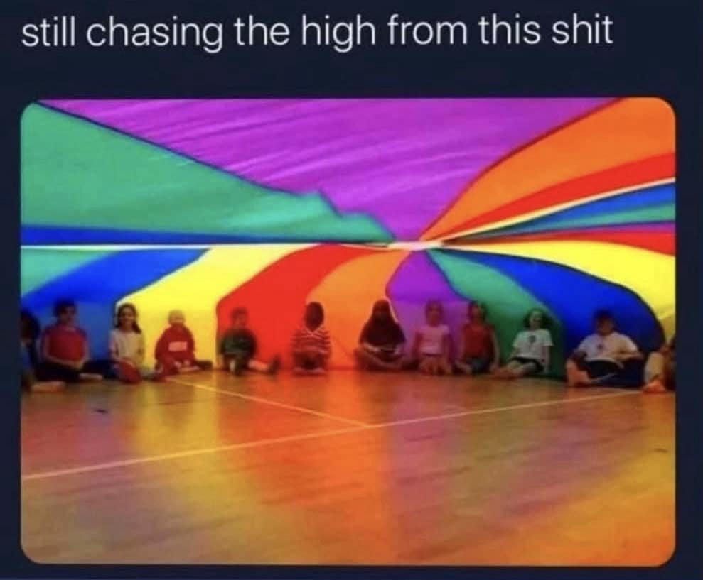 A classic meme nostalgia post showing kids playing with a rainbow parachute in gym class.