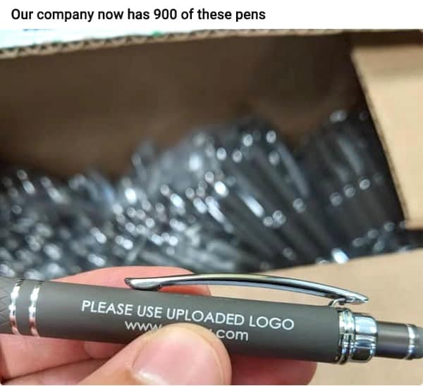 A classic meme showing a promotional pen printed with the text "Please use uploaded logo".