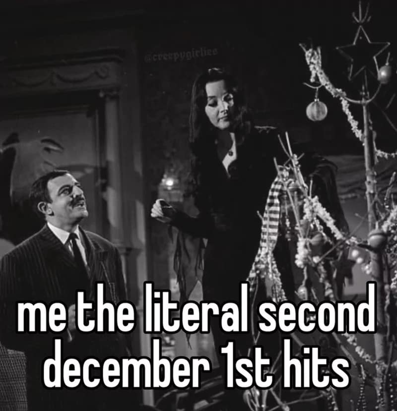 Morticia Addams cutting a rose while Gomez watches in a December 1st meme.