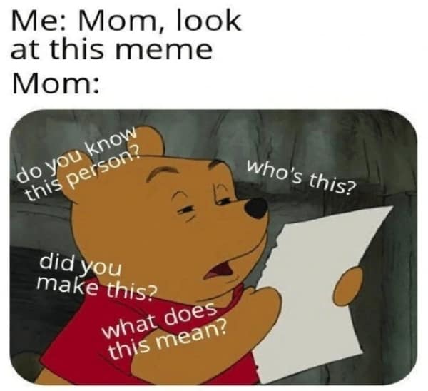 Winnie the Pooh reading a paper looking confused while squinting eyes.
