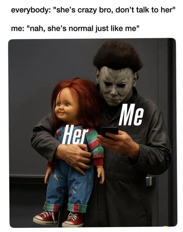 Michael Myers holding Chucky doll while looking at a cellphone together.