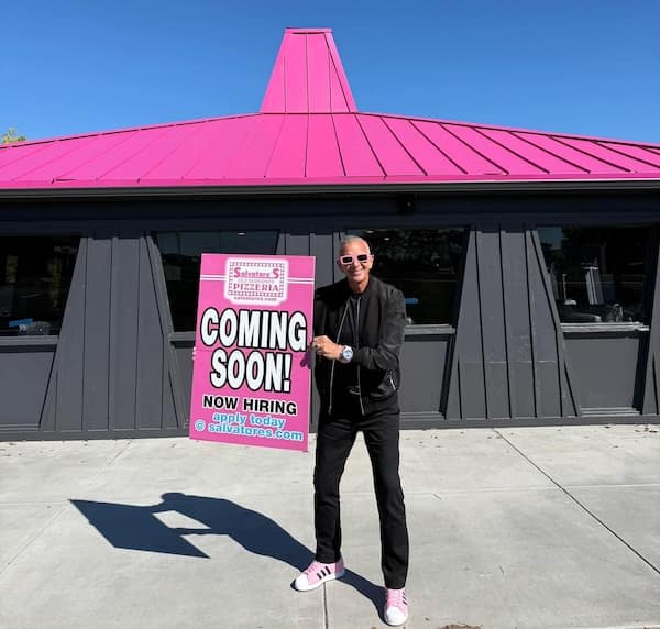 Salvatore's Pizzeria opening soon in a bright pink painted former Pizza Hut.